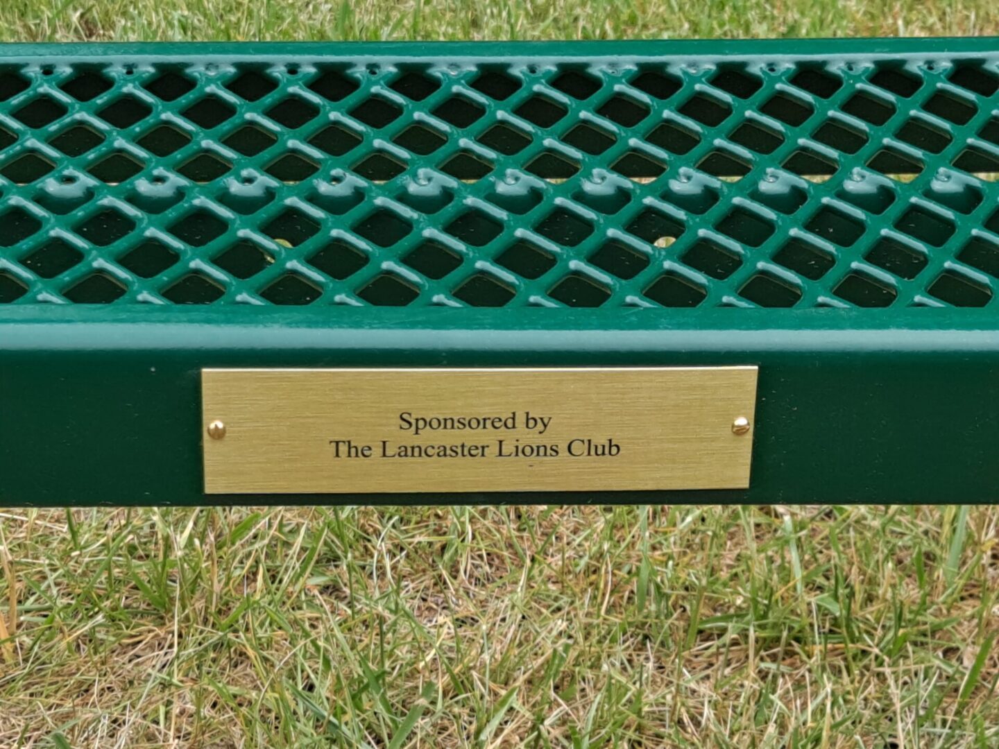 Sponsored by the lancaster lions club batch on the bench